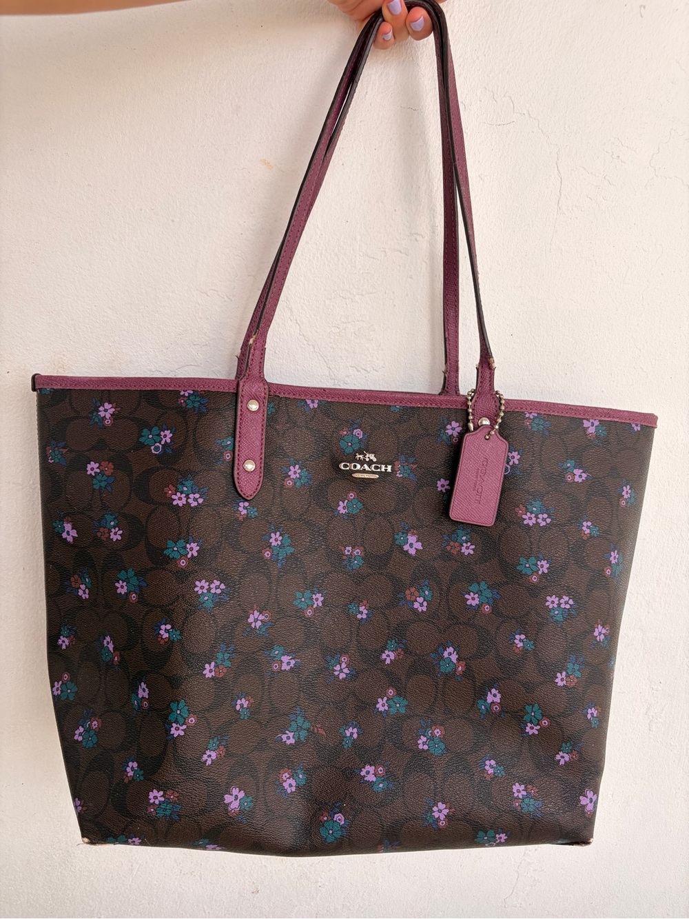 COACH Brown Signature Floral Tote with Plum Trim and Straps